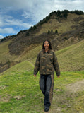 DAXUEN olive green camouflage utility jacket — model photo
