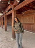 DAXUEN olive green camouflage utility jacket — model photo