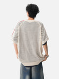 DAXUEN black open-knit mesh top with bold graphics
