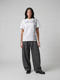 DAXUEN Ornate script and piano key graphic T-shirt — model photo