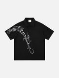 DAXUEN Ornate script embroidered polo shirt