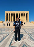 DAXUEN Oversized jersey t-shirt with graphic details — model photo
