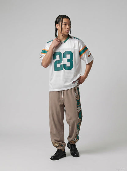 DAXUEN Oversized jersey t-shirt with graphic details — model photo