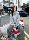DAXUEN heather grey oversized balloon-sleeve hooded jacket — model photo