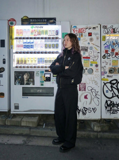 DAXUEN Oversized bomber jacket in black and navy — model photo