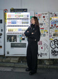 DAXUEN Oversized bomber jacket in black and navy — model photo