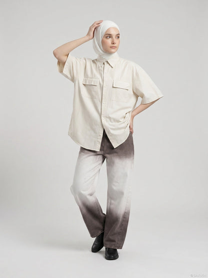 DAXUEN Oversized short-sleeve button-up shirt in cream and brown — model photo