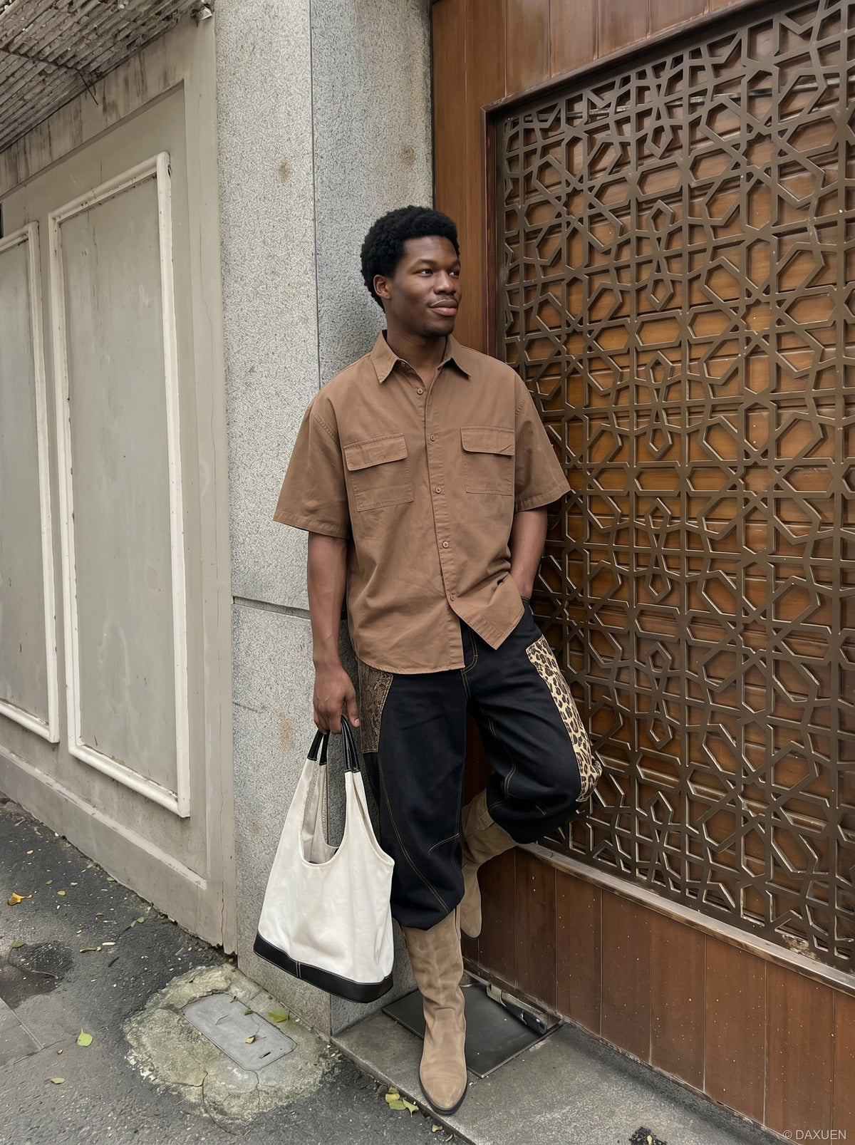 DAXUEN Oversized short-sleeve button-up shirt in cream and brown — model photo