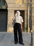 DAXUEN Oversized short-sleeve button-up shirt in cream and brown — model photo