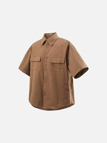 DAXUEN Oversized short-sleeve button-up shirt in cream and brown — model photo