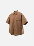 DAXUEN Oversized short-sleeve button-up shirt in cream and brown — model photo