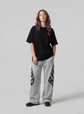 DAXUEN Oversized short-sleeved crew neck T-shirt with cartoon pony graphic — model photo