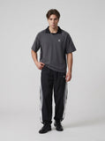 DAXUEN Men's oversized short-sleeved polo shirt — model photo