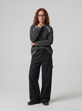 DAXUEN dark charcoal oversized wide-leg denim trousers — model photo