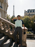 DAXUEN dark charcoal oversized wide-leg denim trousers — model photo