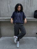 DAXUEN Oversized deconstructed t-shirt in olive green and navy — model photo