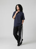 DAXUEN Oversized deconstructed t-shirt in olive green and navy — model photo