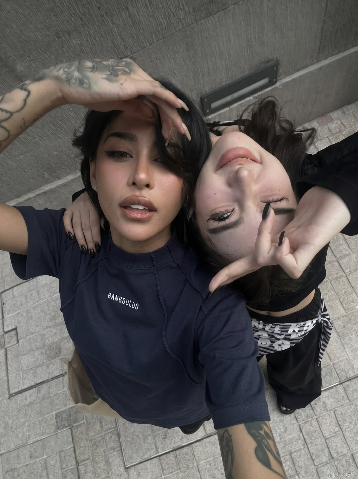 DAXUEN Oversized deconstructed t-shirt in olive green and navy — model photo