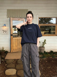DAXUEN Oversized deconstructed t-shirt in olive green and navy — model photo