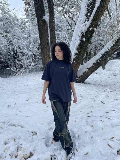 DAXUEN Oversized deconstructed t-shirt in olive green and navy — model photo
