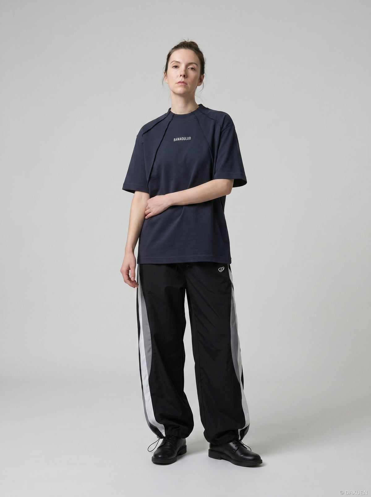DAXUEN Oversized deconstructed t-shirt in olive green and navy — model photo