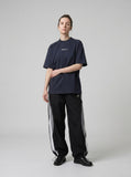 DAXUEN Oversized deconstructed t-shirt in olive green and navy — model photo