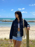 DAXUEN Oversized denim jacket with embroidery and pockets — model photo