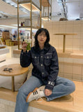 DAXUEN Oversized denim jacket with embroidery and pockets — model photo