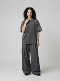 DAXUEN Oversized short-sleeved distressed crewneck T-shirt — model photo