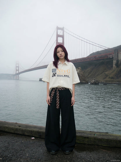 DAXUEN Oversized short-sleeve button-up shirt with graphic print — model photo