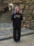 DAXUEN Oversized short-sleeve button-up shirt with graphic print — model photo