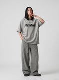 DAXUEN Oversized polo shirt with graphic and embroidery — model photo
