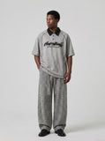 DAXUEN Oversized polo shirt with graphic and embroidery — model photo