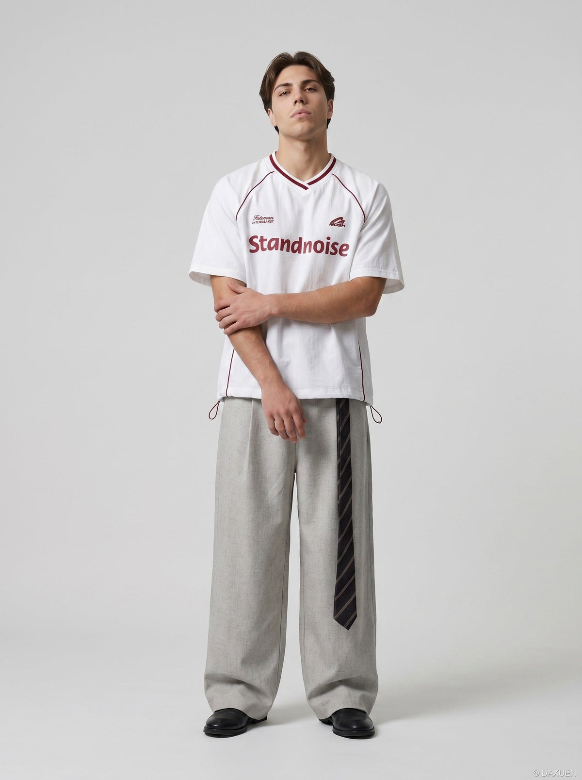 DAXUEN Oversized V-neck graphic t-shirt with drawstring hem — model photo