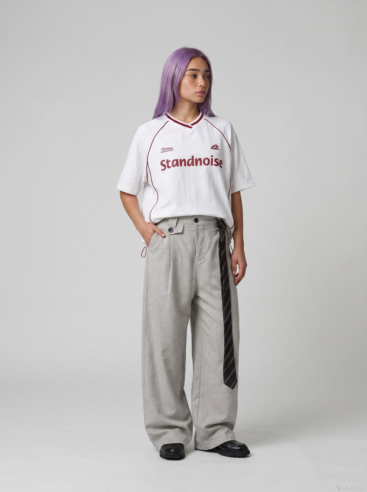 DAXUEN Oversized V-neck graphic t-shirt with drawstring hem — model photo