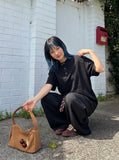 DAXUEN Oversized short-sleeved Henley t-shirt — model photo