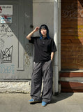 DAXUEN Oversized short-sleeved Henley t-shirt — model photo