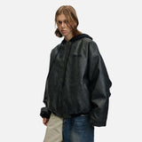 DAXUEN Oversized hooded bomber jacket in black faux leather — model photo