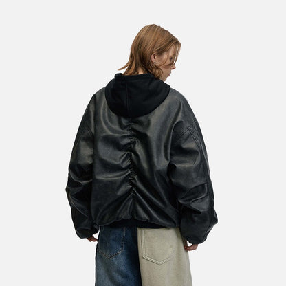 DAXUEN Oversized hooded bomber jacket in black faux leather — model photo