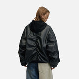 DAXUEN Oversized hooded bomber jacket in black faux leather — model photo