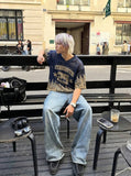 DAXUEN Oversized mesh jersey top with flame graphics — model photo