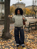 DAXUEN Padded bomber jacket in black and sage green colors — model photo