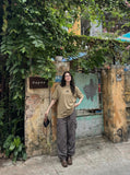 DAXUEN Oversized short-sleeved paint splash t-shirt — model photo