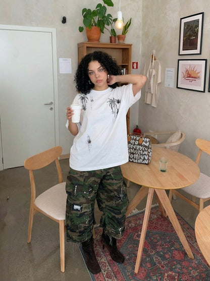 DAXUEN Oversized crew neck t-shirt with palm tree graphics — model photo