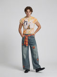 DAXUEN Women's pastel plaid rabbit graphic T-shirt — model photo