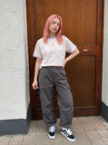 DAXUEN Pastel stripe graphic t-shirt with crew neck and short sleeves — model photo