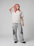 DAXUEN Pastel stripe graphic t-shirt with crew neck and short sleeves — model photo