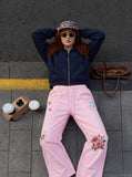 DAXUEN pastel pink and blue floral graphic wide-leg sweatpants — model photo