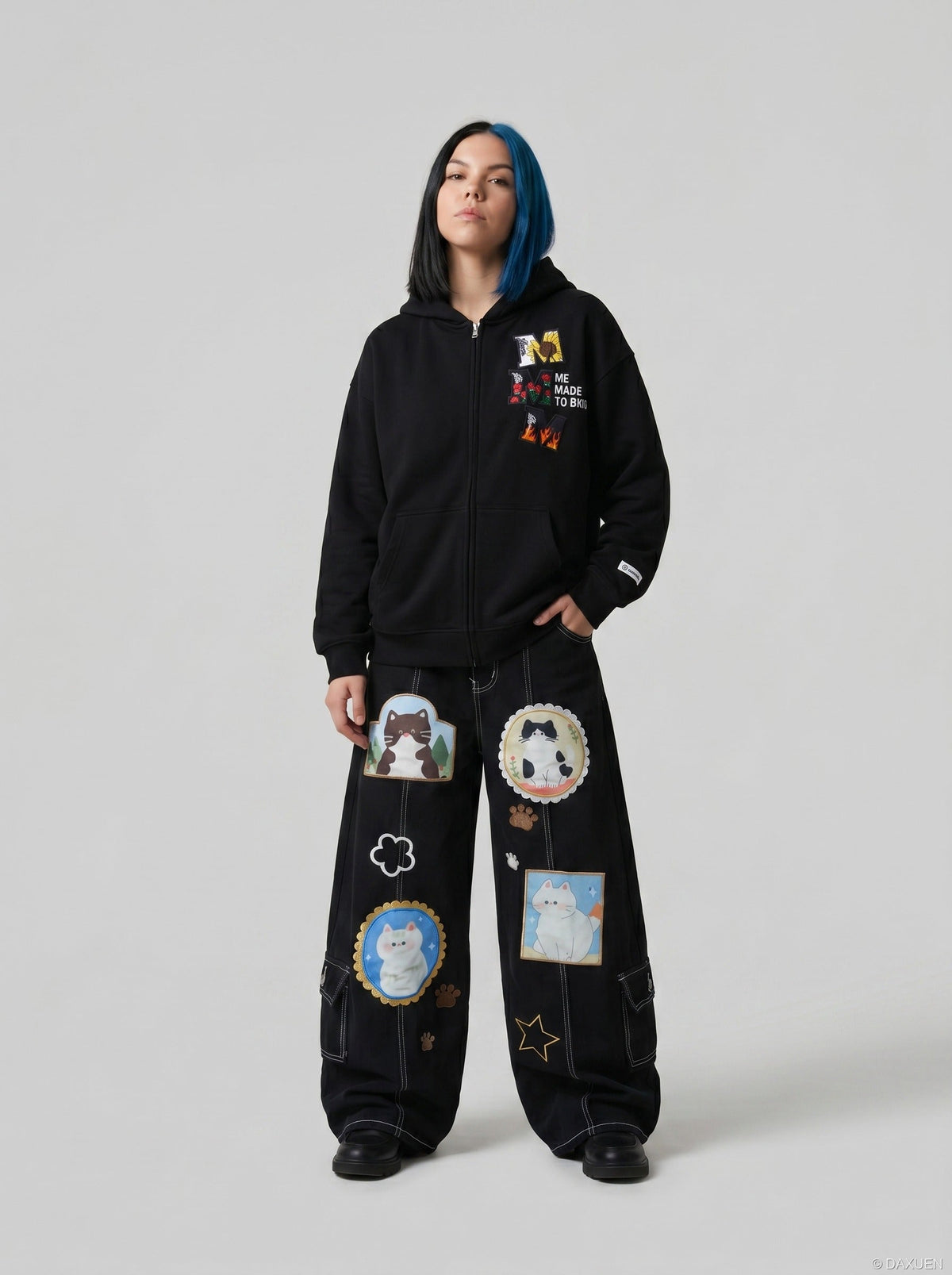 DAXUEN Black wide leg cargo pants with colorful cat patches — model photo