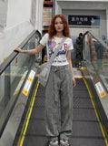 DAXUEN Women's short-sleeved patriotic graphic t-shirt — model photo